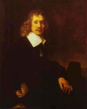 Haga click para ver la imagen ampliada a young man seated at a table.jpg